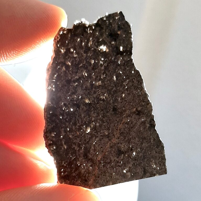 Martian meteorite. NWA 13190. Rock from Mars. Translucent slice.