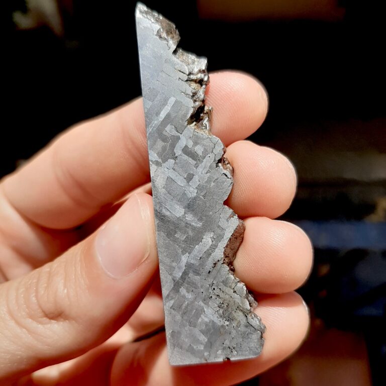 Cape York meteorite. Slice with crust.