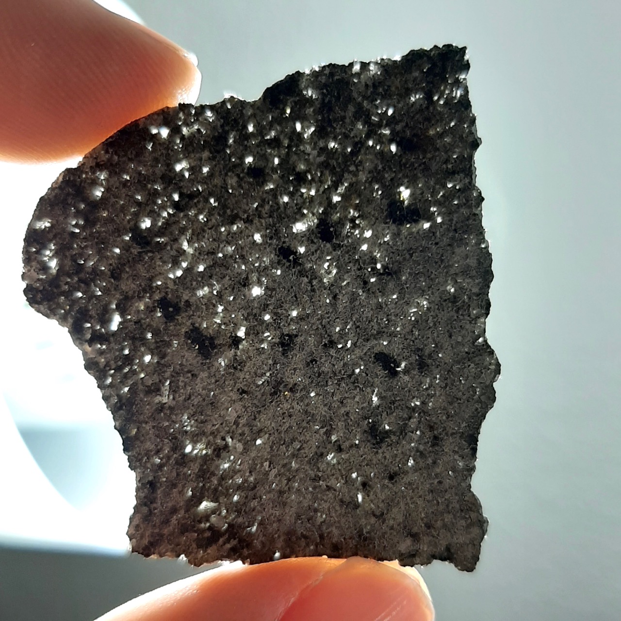 Martian meteorite. NWA 13190. Translucent slice.