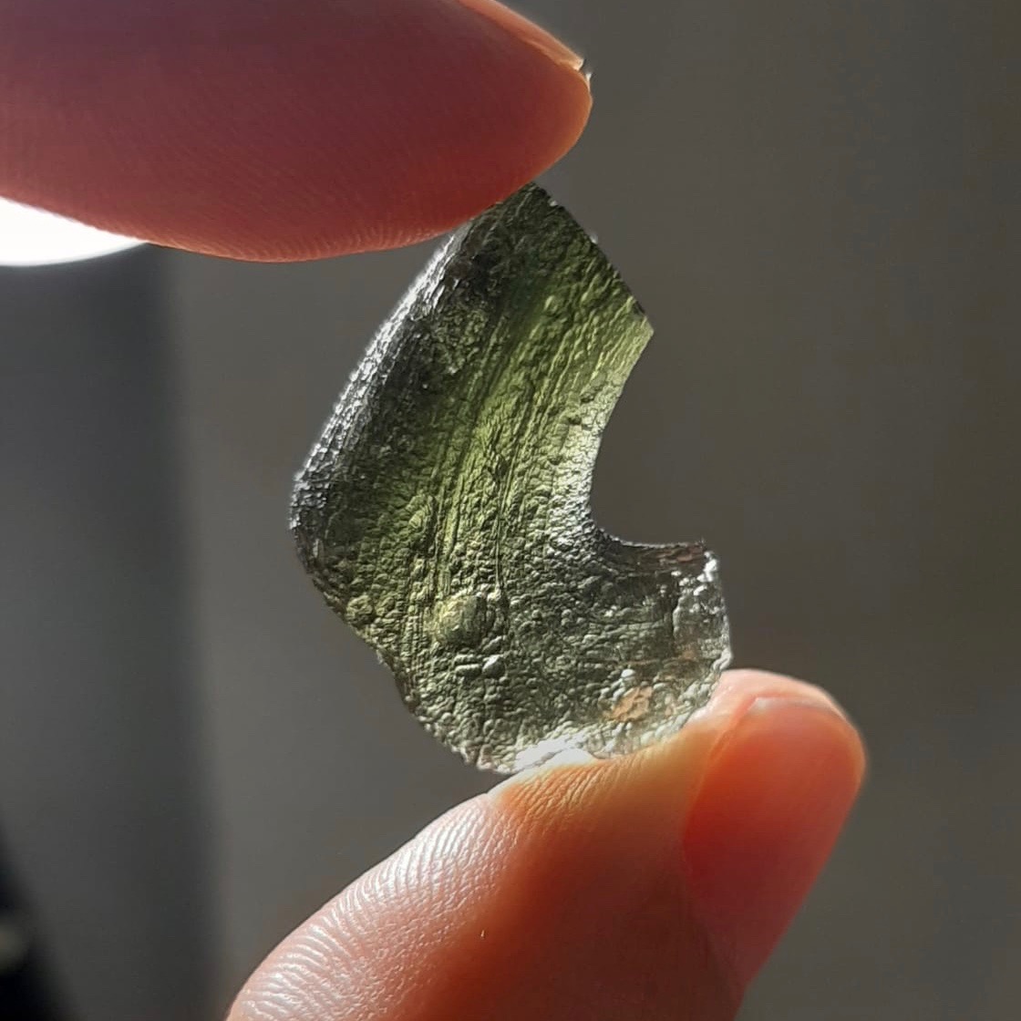 Moldavite. Meteorite impact glass.